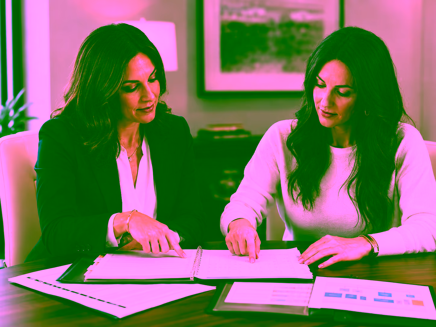 Family law attorney helping a client prepare documents and priorities for mediation